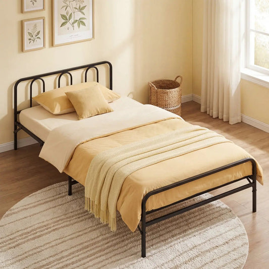 Heavy duty metal twin bed frame with headboard and footboard in black, beige bedding shown on Tampa Home & Garden Store