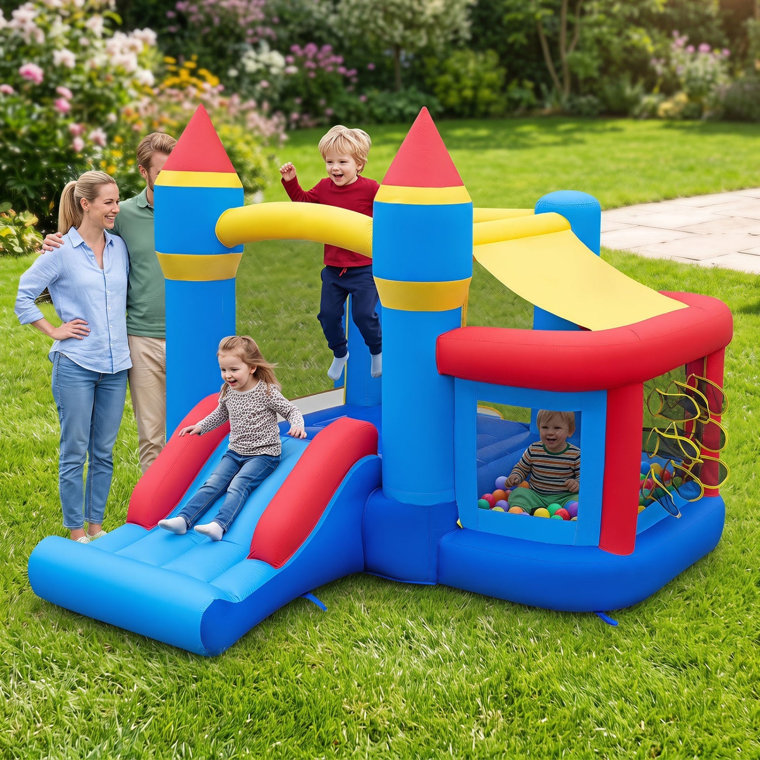 Inflatable bounce house with slide and ball pit in blue red yellow for outdoor fun on Tampa Home & Garden Store