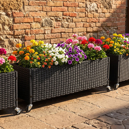 Raised garden bed with wheels, PE rattan planter box; three black wicker planters on casters on Tampa Home & Garden Store