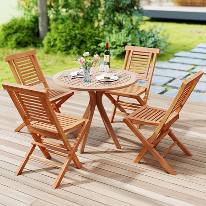 Teak wood folding patio dining chairs set of 4 around a round table on a deck on Tampa Home & Garden Store