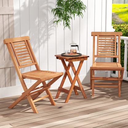 Teak wood folding patio dining chairs set of 2 with slatted backs on a wooden deck on Tampa Home & Garden Store
