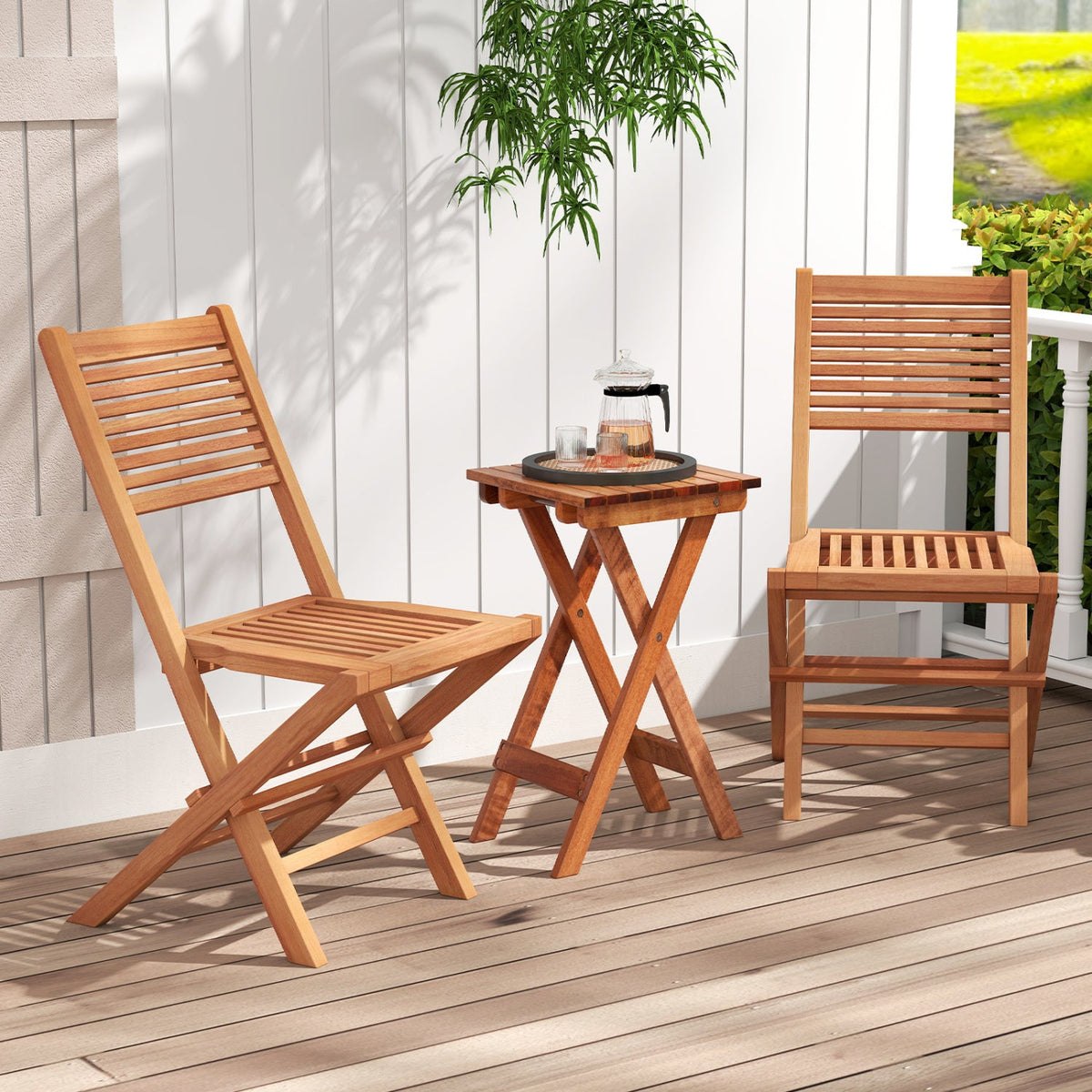 Teak wood folding patio dining chairs set of 2 with slatted backs on deck on Tampa Home & Garden Store