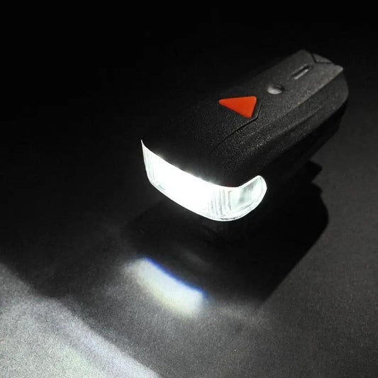 USB rechargeable bike headlight Stevvex, black front light with 2 LEDs and red power button on Tampa Home & Garden Store