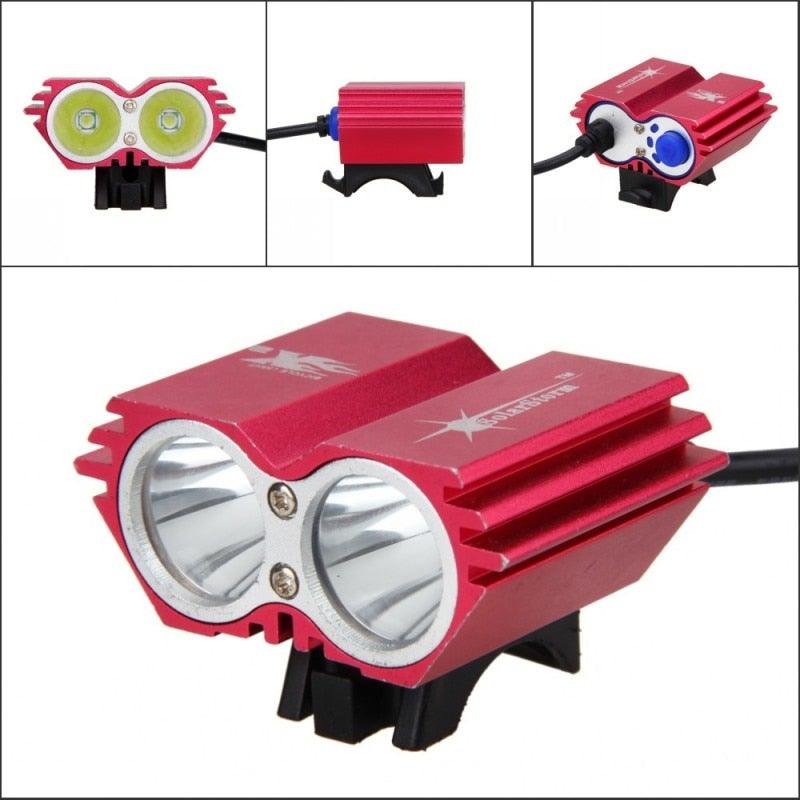Stevvex USB waterproof bike light dual-LED front light, red aluminum housing, mounted on bracket on Tampa Home & Garden Store