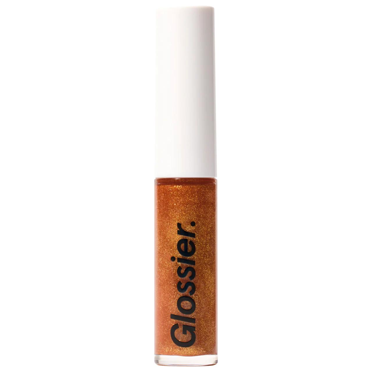Lip gloss Glassy copper glitter on white-cap tube by Glossier, high-shine finish on Tampa Home & Garden Store