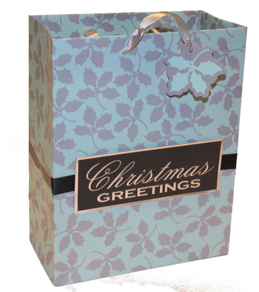 Traditional handmade Christmas gift bags with blue holly pattern and silver ribbon handle on Tampa Home & Garden Store