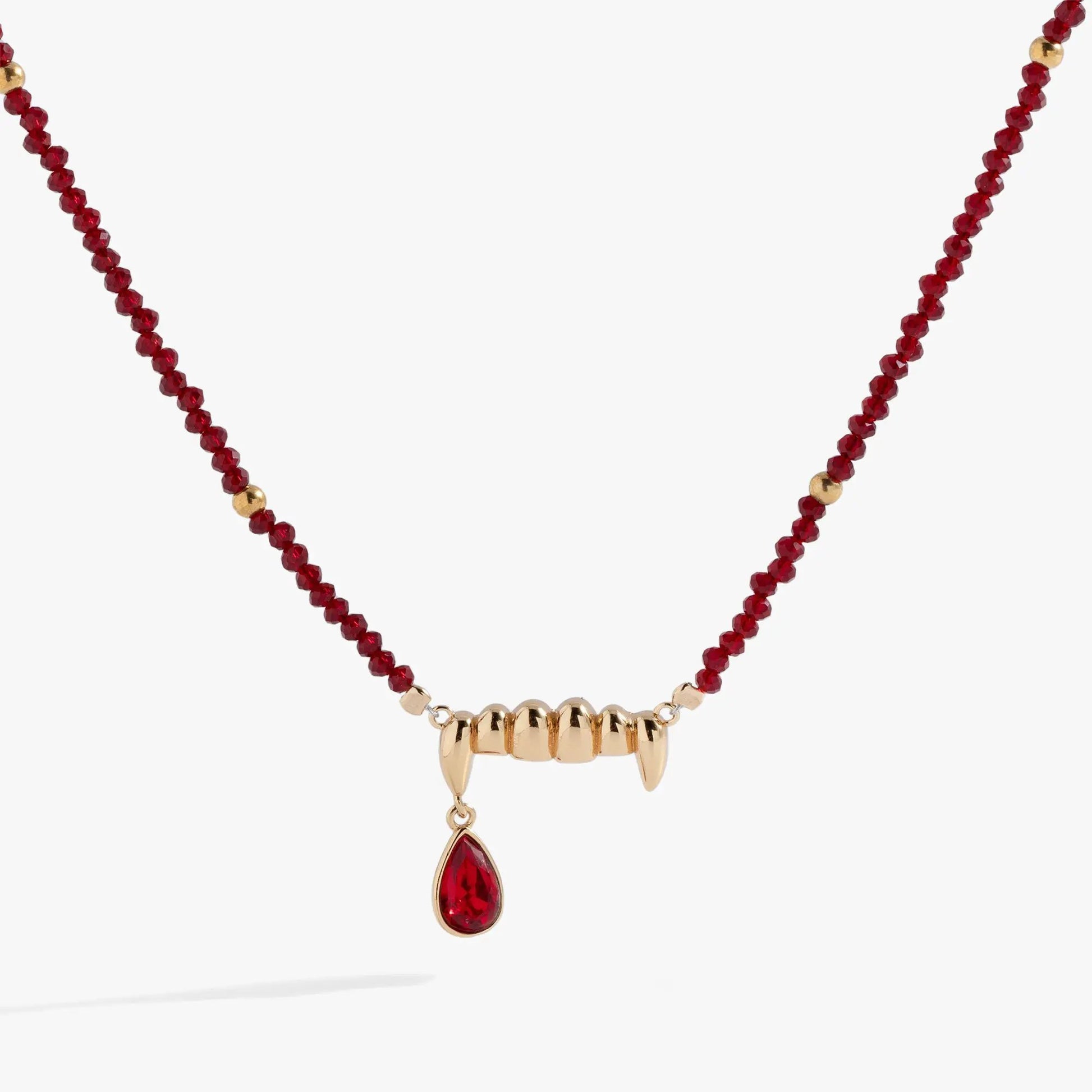 Vampire Teeth Fangs Pendant necklace with red faceted beads and gold-tone fang centerpiece on Tampa Home & Garden Store