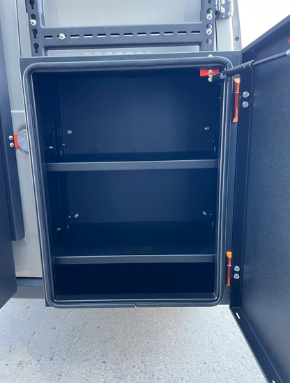 Avatar Kilo small storage box, black interior cargo cabinet with two shelves, orange side latch on Tampa Home & Garden Store