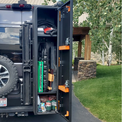 Avatar Ski 4 Storage Box black steel cabinet on pickup bed with orange latches and ski gear on Tampa Home & Garden Store