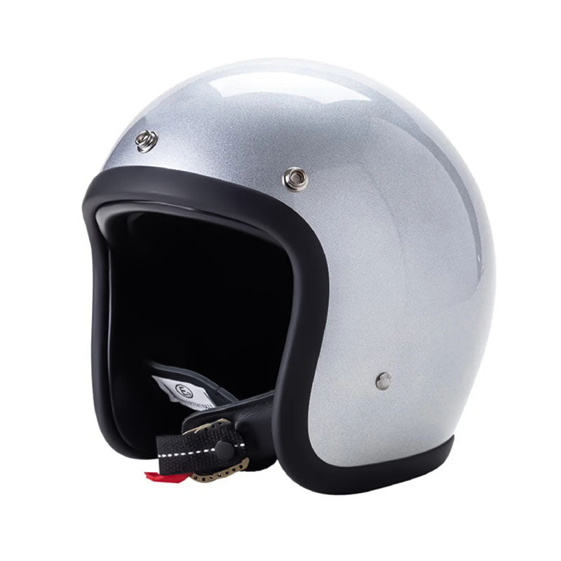 Low profile vintage motorcycle helmet, metallic silver open-face with black padding and strap on Tampa Home & Garden Store