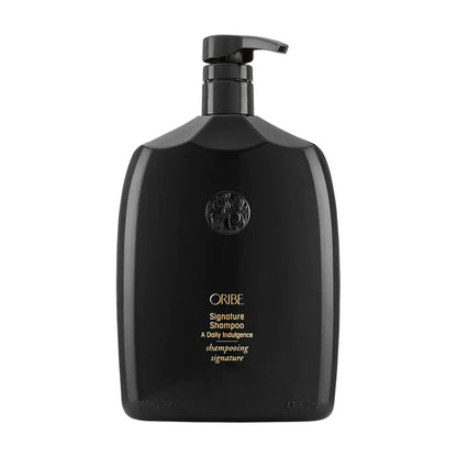 Oribe Signature Shampoo bottle in black glossy finish with pump top and gold logo, Nava Beauty branding on Tampa Home & Garden Store