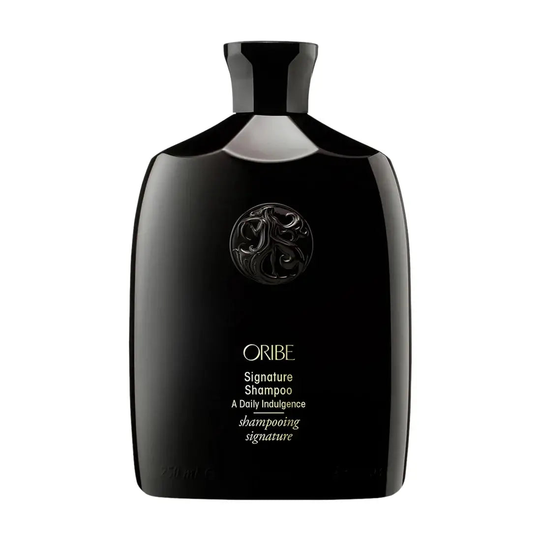 Oribe Signature Shampoo bottle black glossy plastic with embossed crest and gold lettering on Tampa Home & Garden Store