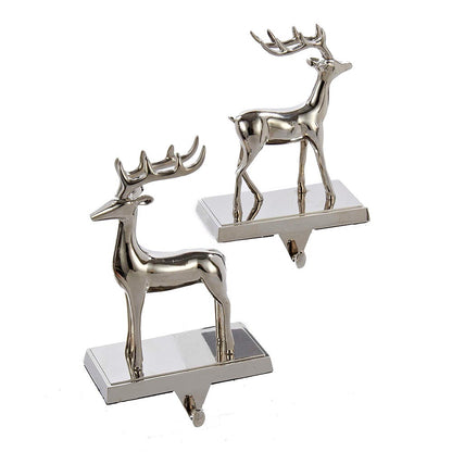 Pair of silver metal reindeer stocking hangers on bases by The Country Christmas Loft on Tampa Home & Garden Store