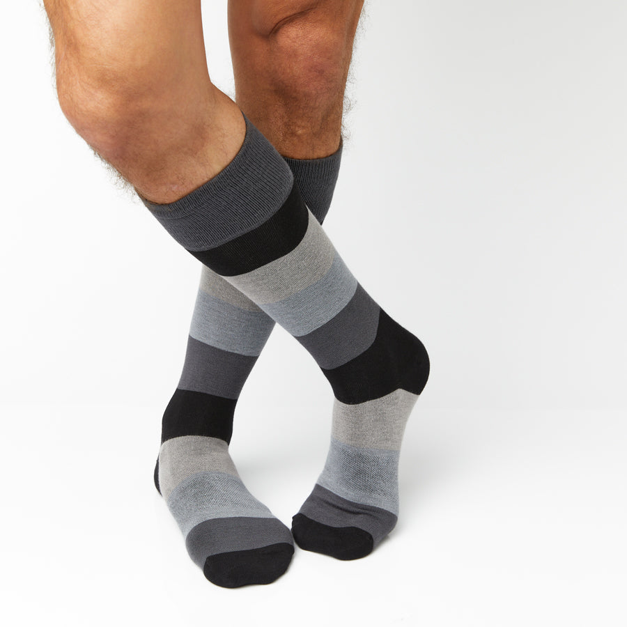 Vega Dress Socks by DeadSoxy, boardroom dress socks in gray and blue striped pattern, pair on Tampa Home & Garden Store
