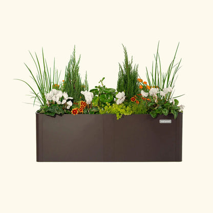 27 by 53 inches modern metal raised garden bed brown finish with lush greenery and flowers Vego Garden on Tampa Home & Garden Store