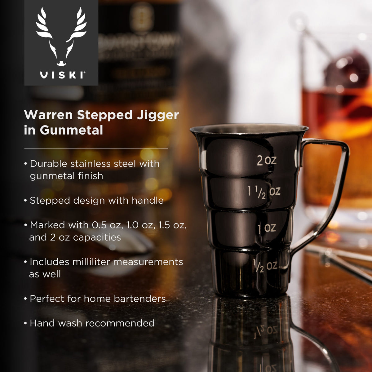Gunmetal Viski stepped jigger with etched measurements (2 oz to 1/2 oz) on a bar backdrop on Tampa Home & Garden Store