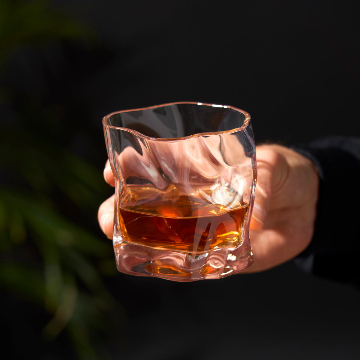 Molten stemless cocktail glass by Viski in pink tinted crystal on Tampa Home & Garden Store