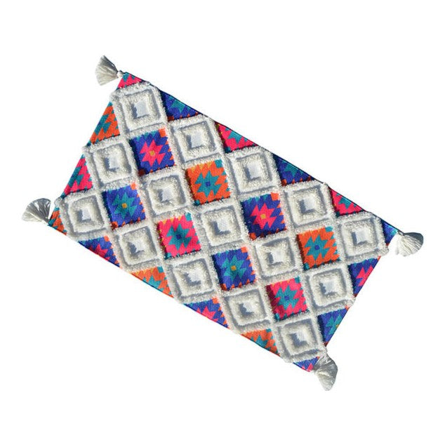 Vibhsa woven accent rug in multi color with tassels and diamond pattern on Tampa Home & Garden Store
