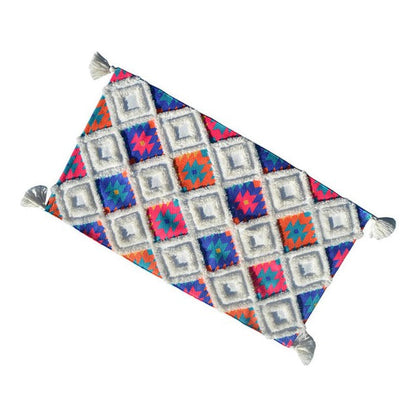 Vibhsa woven accent rug in multi color with tassels and diamond pattern on Tampa Home & Garden Store