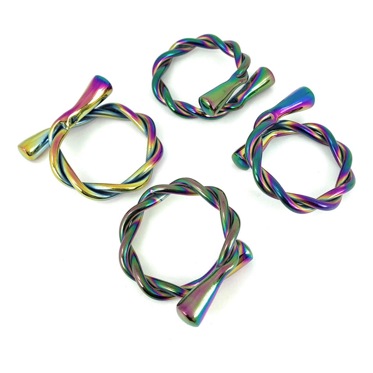 Vibhsa rainbow twisted napkin rings, set of 4 in stainless steel, dishwasher safe on Tampa Home & Garden Store