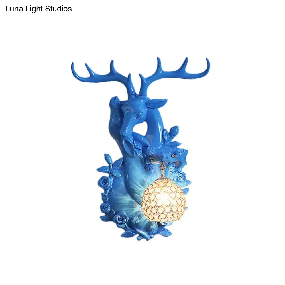 Blue resin deer head sconce with antlers and crystal orb lamp on Tampa Home & Garden Store