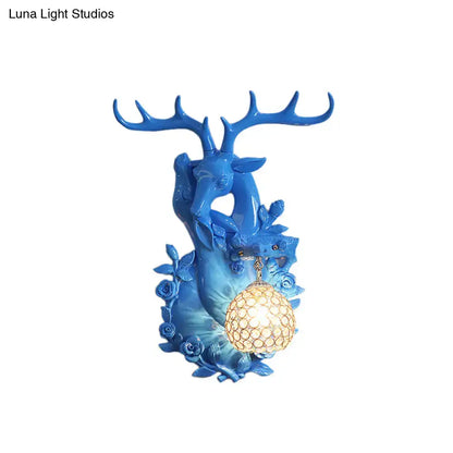 Blue resin deer head sconce with antlers and crystal orb lamp on Tampa Home & Garden Store