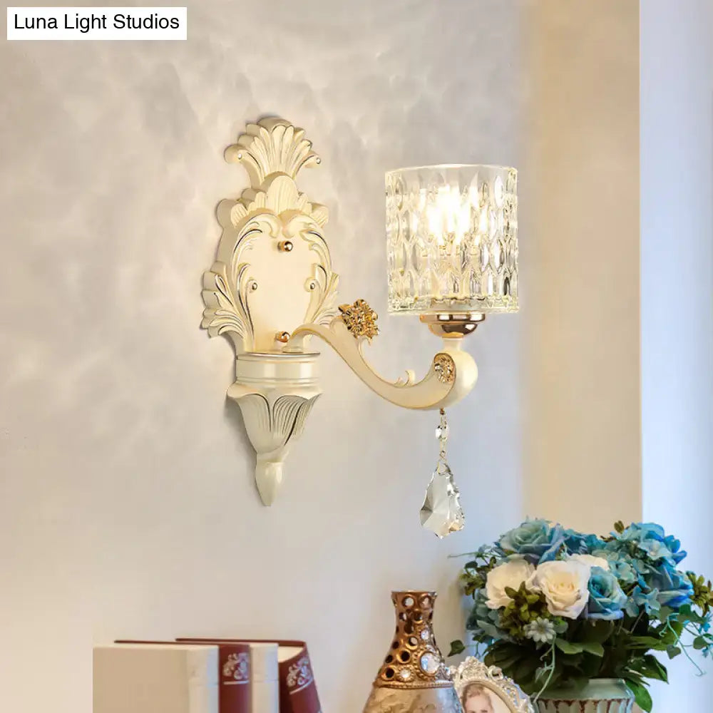Decorbites gold crystal wall sconce with vintage beige finish, ornate backplate and crystal shade on Tampa Home & Garden Store