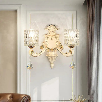 Decorbites gold crystal wall sconce, vintage beige finish, double-arm with crystal shades on Tampa Home & Garden Store