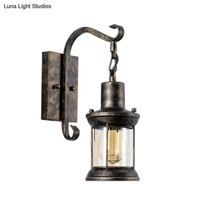 Vintage black lantern wall sconce light fixture by Decorbites with glass panels on Tampa Home & Garden Store