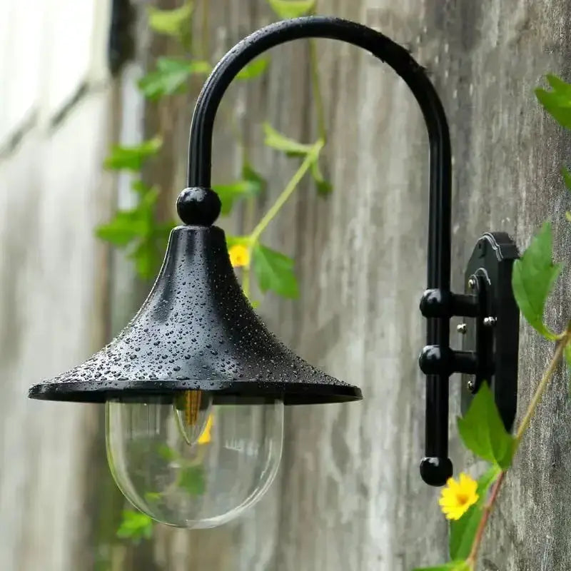 Vintage black metal outdoor wall lamp garden sconce Decorbites with clear glass shade on Tampa Home & Garden Store
