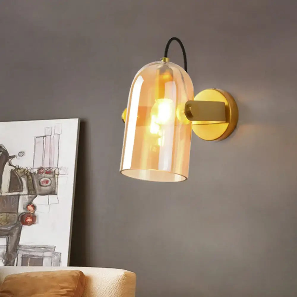 Amber Smoke Gray Glass Wall Sconce by Decorbites; brass backplate, warm amber glow on Tampa Home & Garden Store