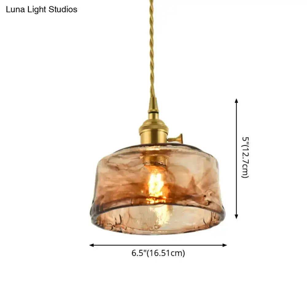 Vintage brass pendant with amber glass shade, 6.5in wide, 5.5in tall, braided cord on Tampa Home & Garden Store