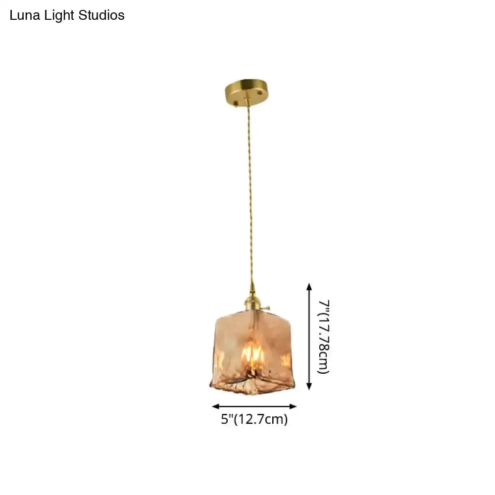 Vintage brass drop pendant light with amber glass shade, 5in wide by 7 7/8in tall on Tampa Home & Garden Store