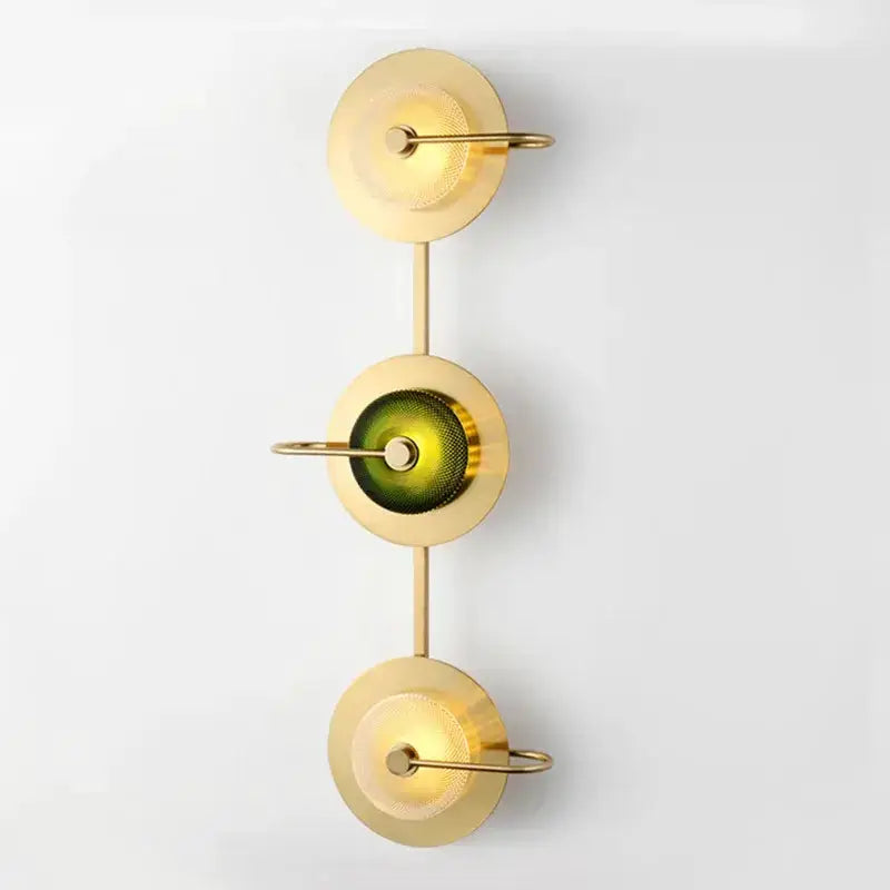 Vintage brass wall art light with circular discs and green glass center by Decorbites on Tampa Home & Garden Store