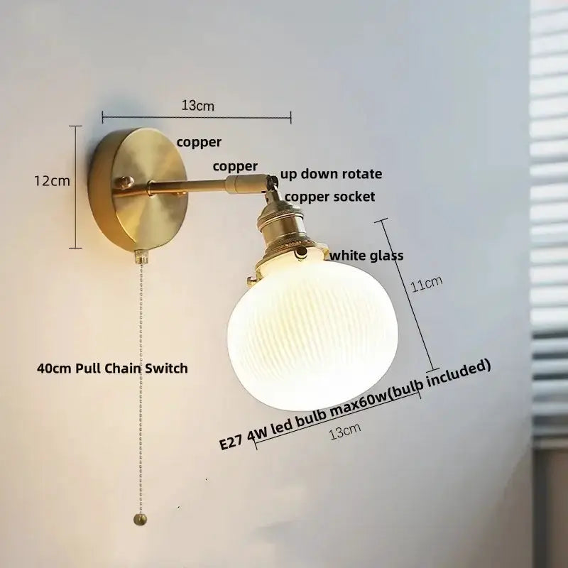 Vintage brass wall light with ruffled white glass shade and pull-chain switch on Tampa Home & Garden Store