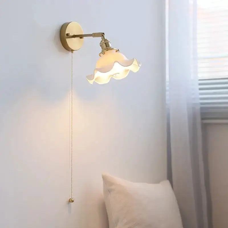 Vintage brass wall sconce with a ruffled white glass shade and LED by Decorbites bathroom light on Tampa Home & Garden Store