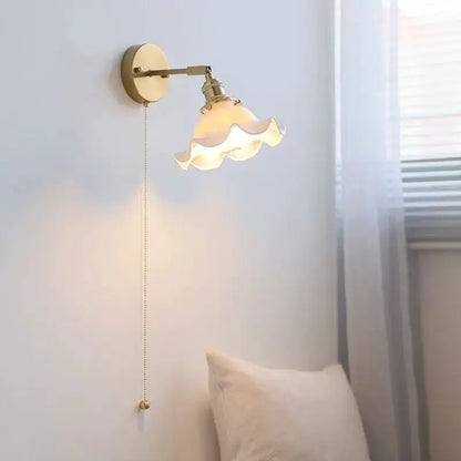 Vintage brass wall sconce with a ruffled white glass shade and LED by Decorbites bathroom light on Tampa Home & Garden Store
