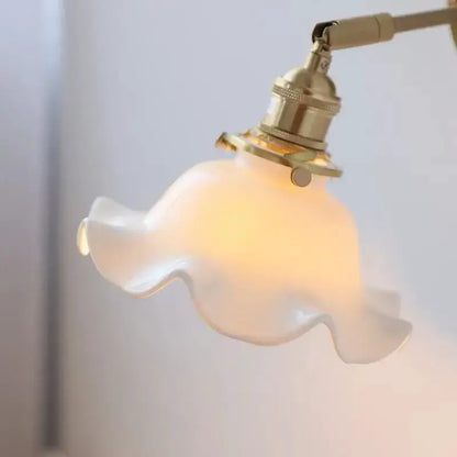 Vintage brass bathroom wall light with a ruffled frosted glass shade and LED bulb Decorbites on Tampa Home & Garden Store