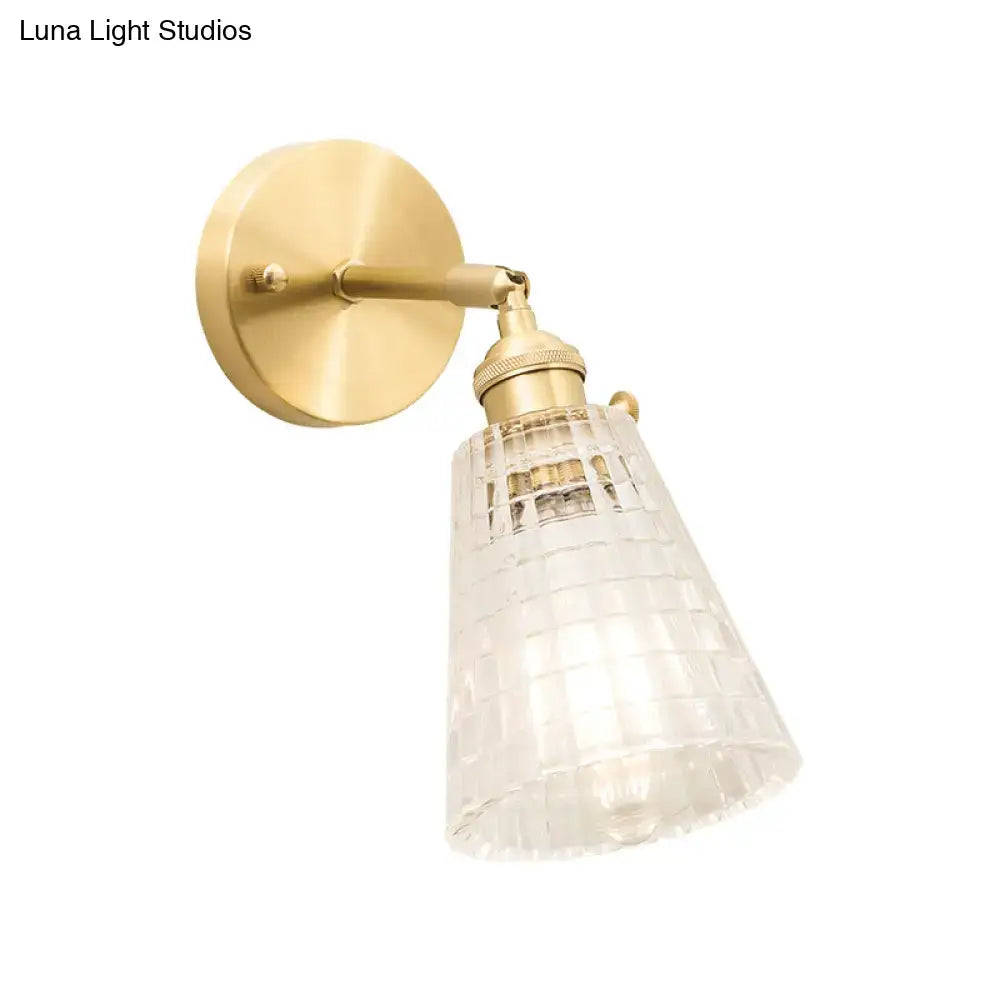 Vintage brass wall sconce with clear ribbed glass shade and LED bulb by Decorbites on Tampa Home & Garden Store