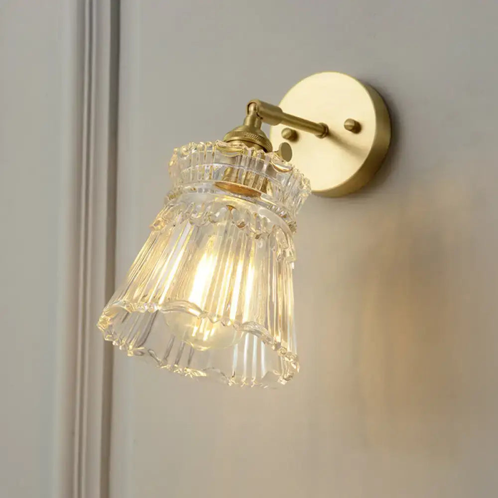 Vintage brass clear ribbed glass wall sconce with LED light by Decorbites on Tampa Home & Garden Store