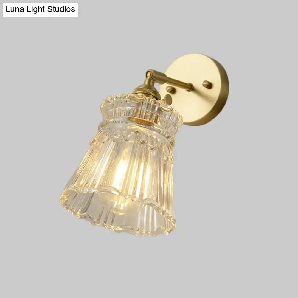 Vintage brass wall sconce with clear ribbed glass shade and LED light Decorbites on Tampa Home & Garden Store