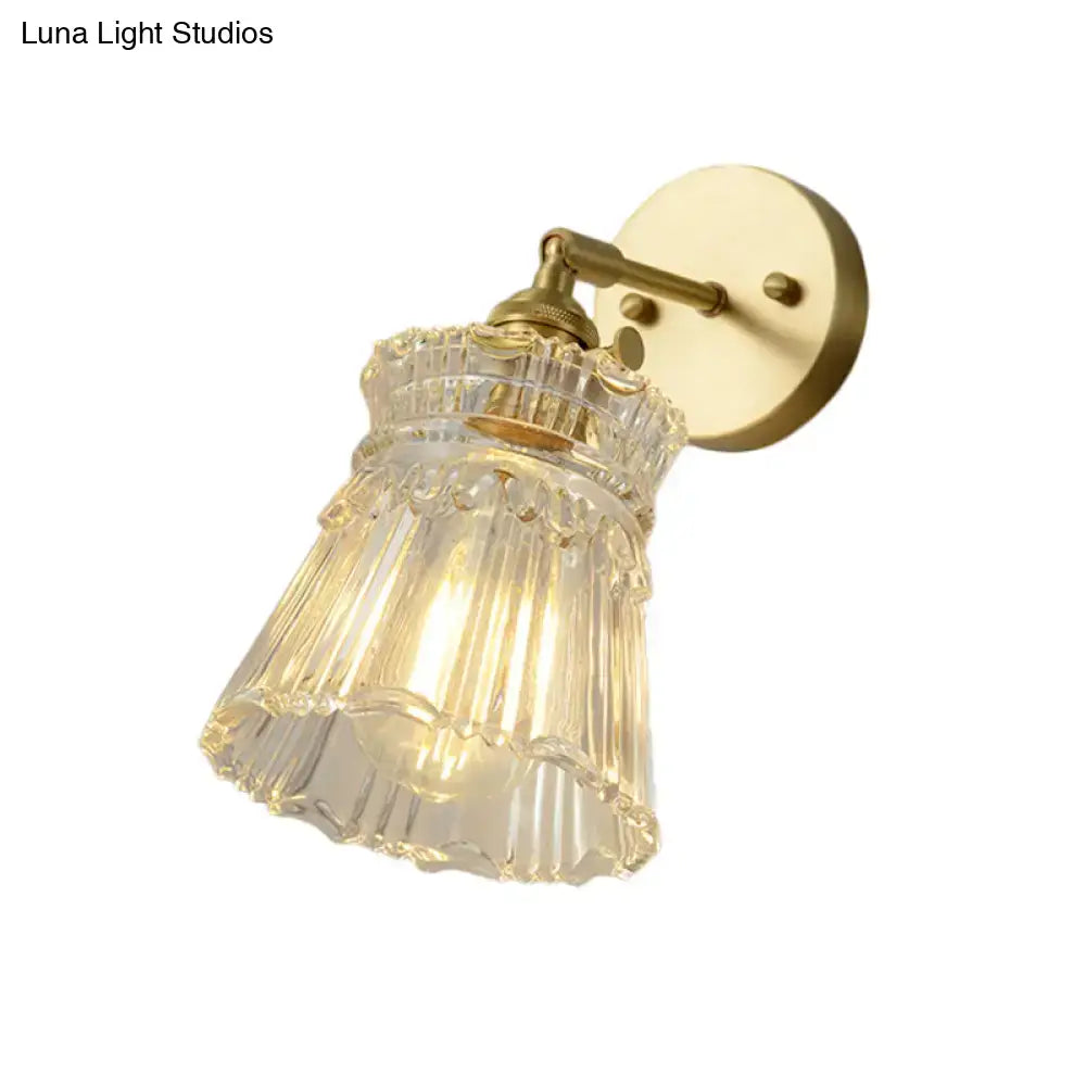 Vintage brass wall sconce with clear ribbed glass shade LED bedroom light on Tampa Home & Garden Store