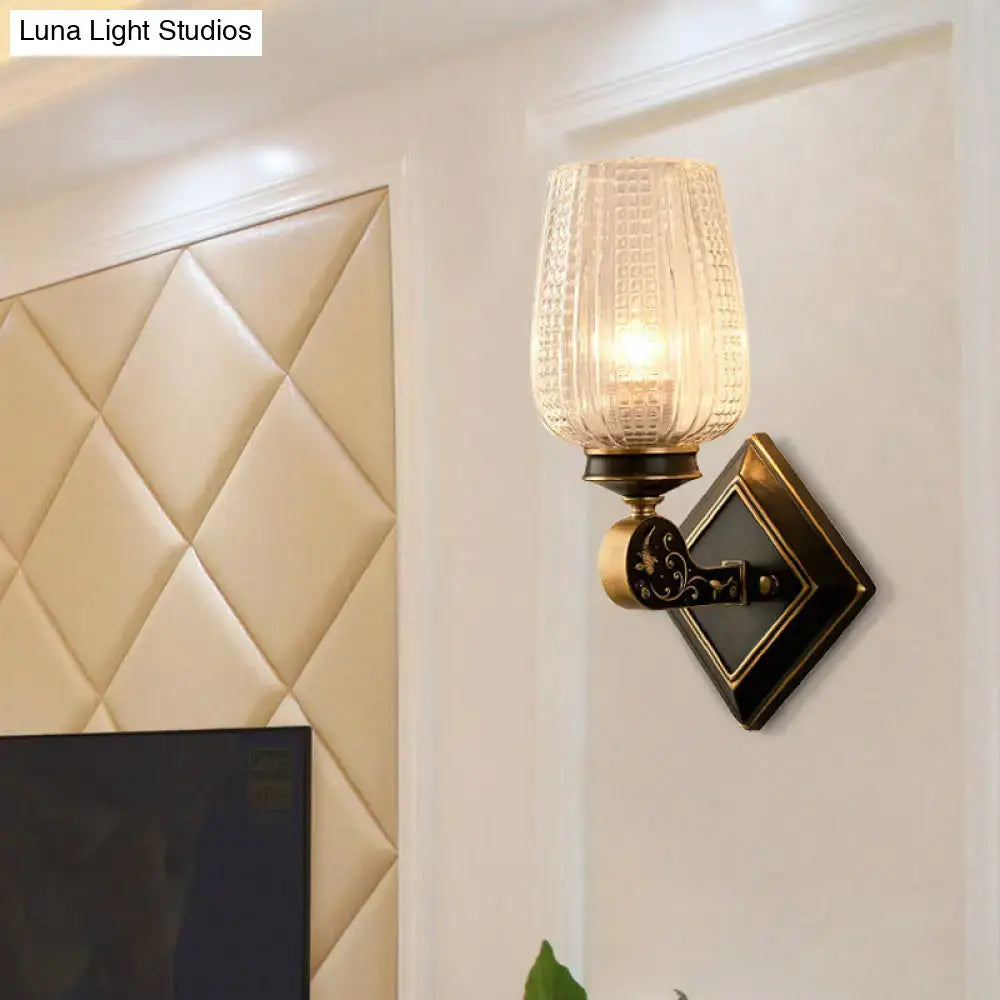Vintage brass wall sconce with clear textured glass shade by Decorbites, living room light on Tampa Home & Garden Store