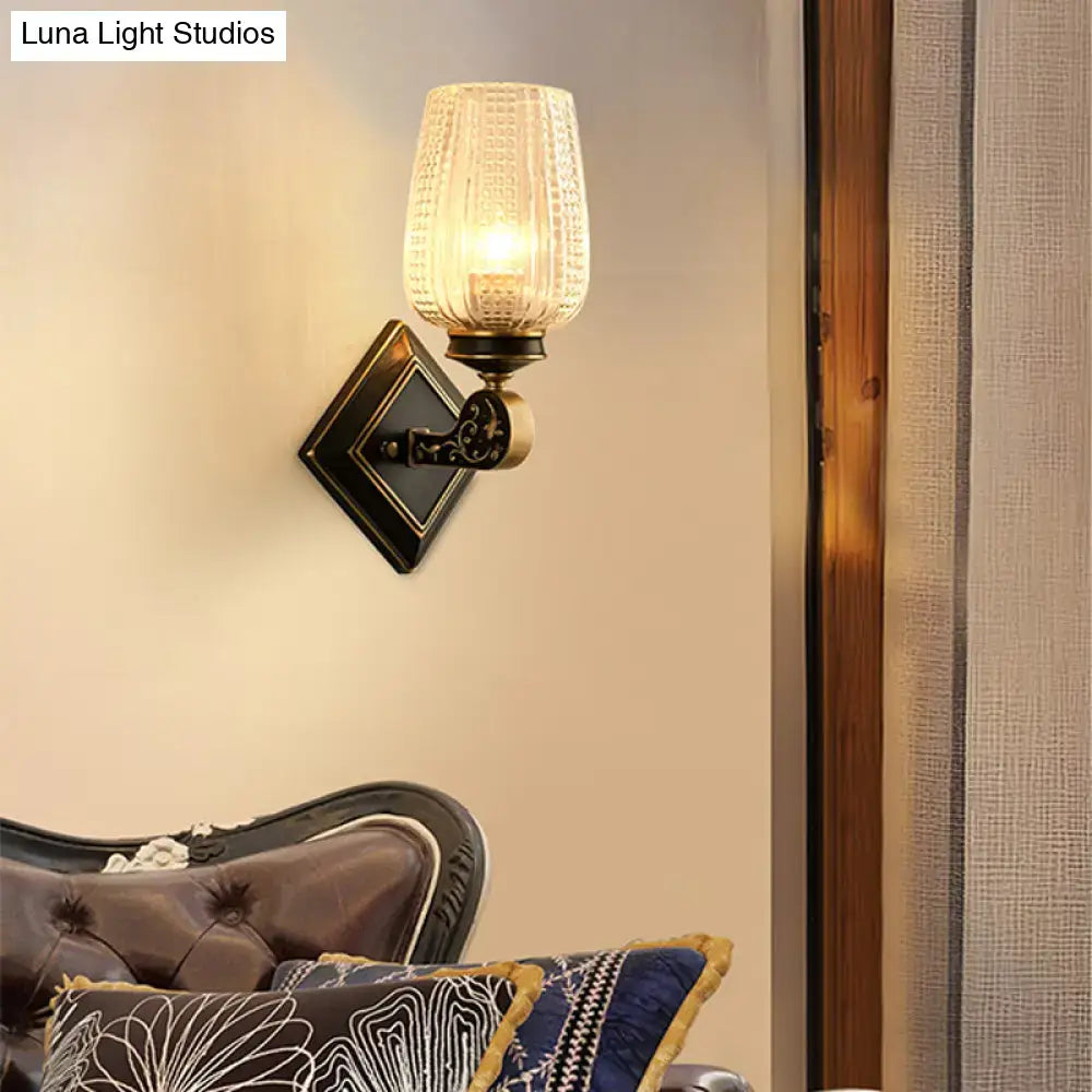 Brass wall sconce with clear textured glass shade, vintage living room lighting on Tampa Home & Garden Store