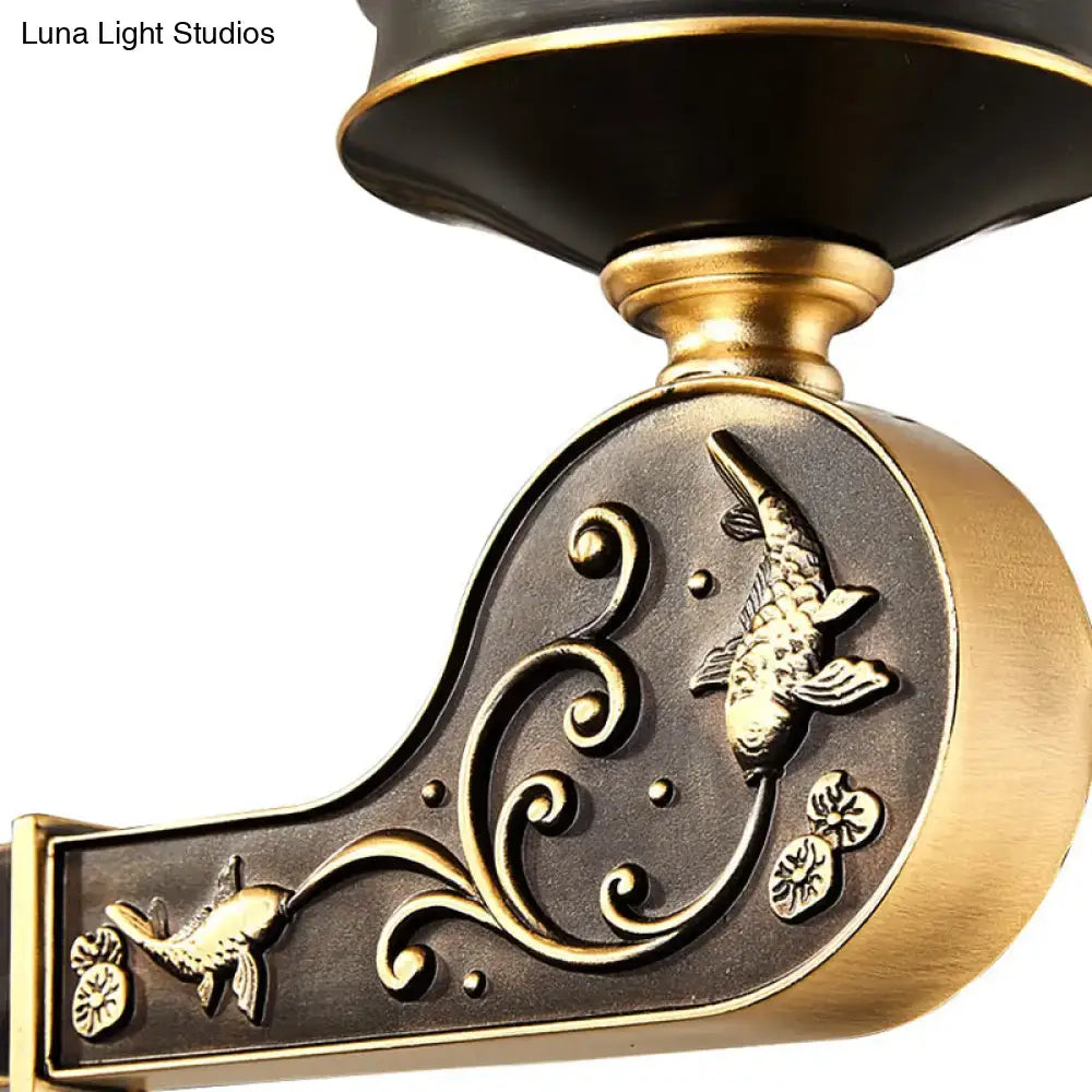 Vintage brass sconce with ornate dark backplate and koi fish scrollwork Decorbites on Tampa Home & Garden Store