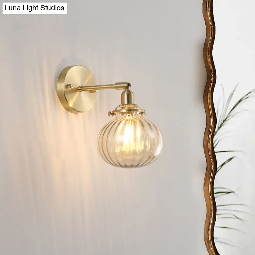 Vintage brass wall light with champagne and clear glass shade, Decorbites wall sconce on Tampa Home & Garden Store