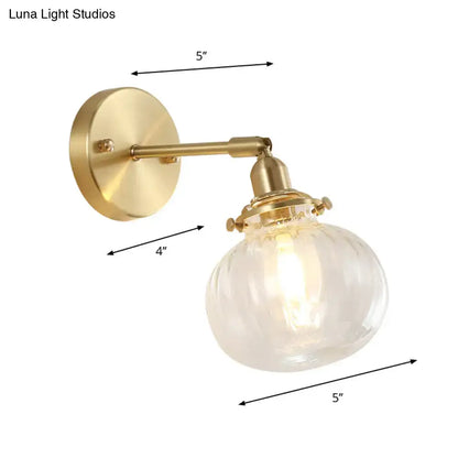 Decorbites vintage brass wall light with champagne and clear glass shade on Tampa Home & Garden Store