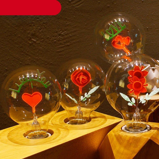 Three vintage Edison bulbs with heart and flower filaments, mood lighting on Tampa Home & Garden Store