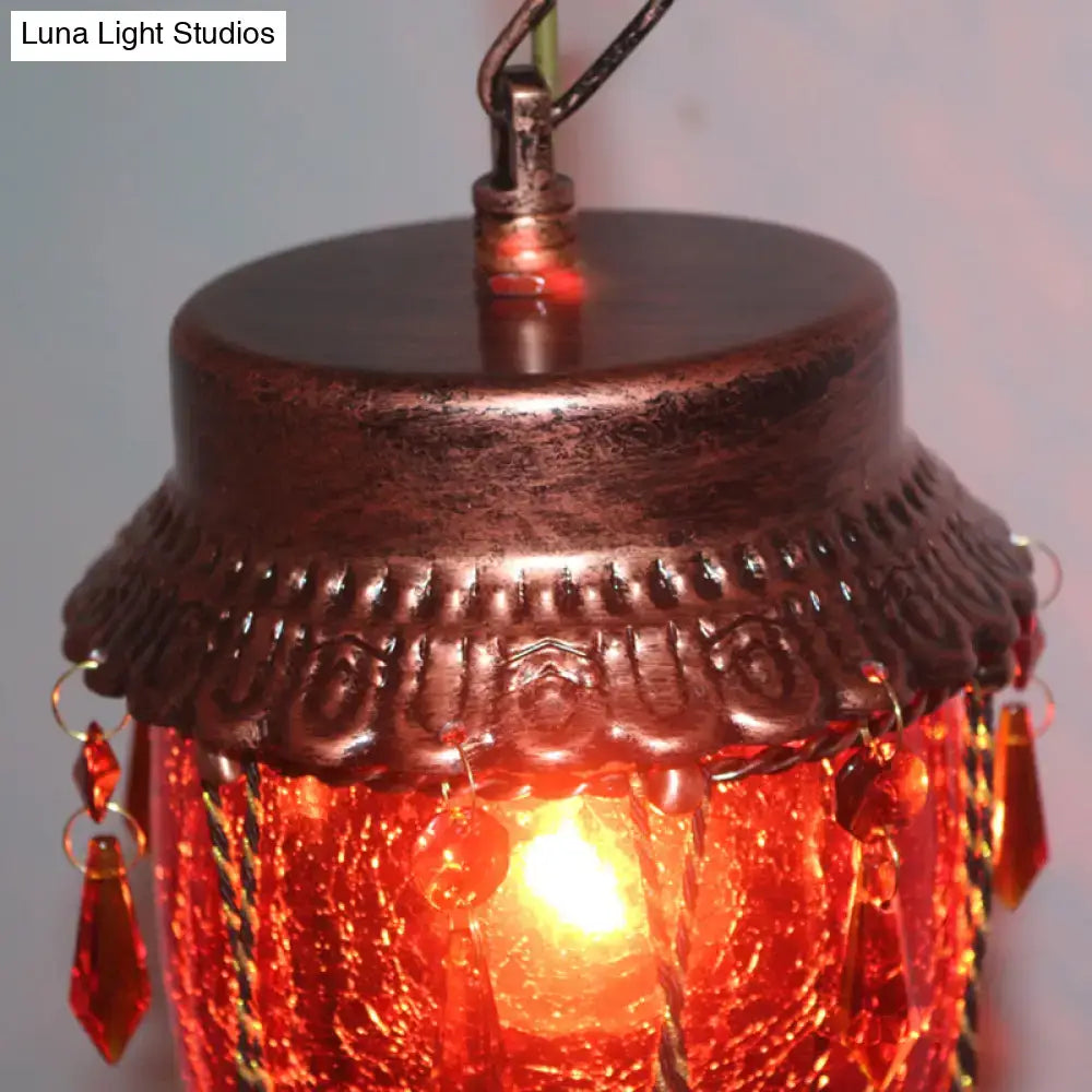 Emerald green glass pendant light with amber bead fringe and bronze top Decorbites on Tampa Home & Garden Store