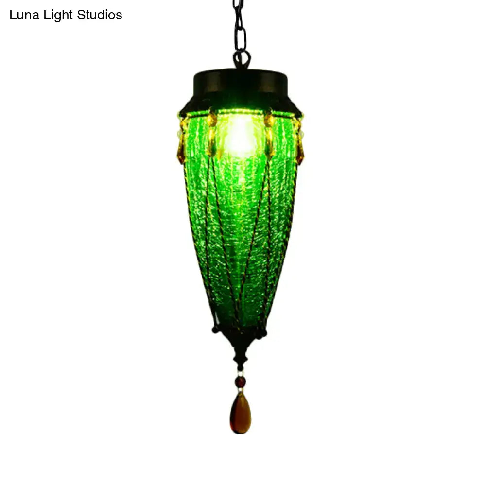 Vintage emerald green glass pendant light with amber bead accents, lantern-style hanging fixture on Tampa Home & Garden Store
